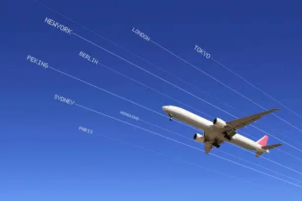 Cargo plane flying toward international destinations including Berlin and New York