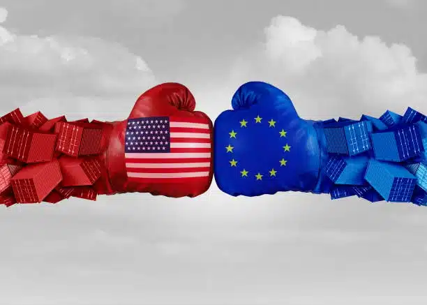 Germany–USA trade relations symbolized by boxing gloves with national and EU flags and cargo containers