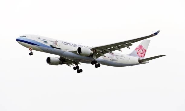 China Airlines cargo aircraft flying through the sky, representing international air freight logistics from China