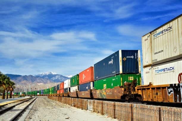 Long train carrying containers for overseas export logistics