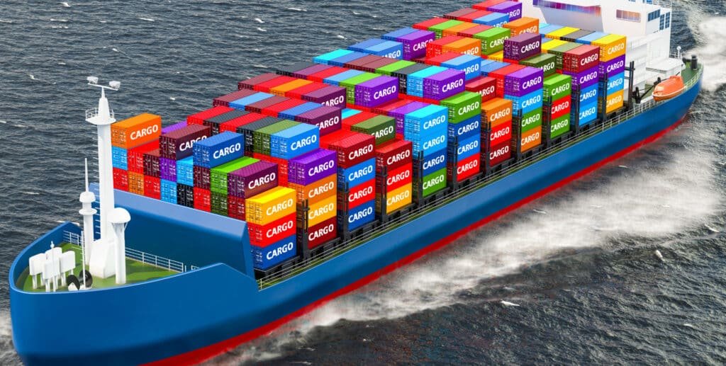 A large container vessel sailing on open water fully loaded with colorful cargo containers labeled ‘CARGO,’ illustrating end-to-end delivery