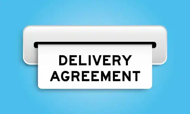 Paper being printed labeled "Delivery Agreement" illustrating shipping contract terms