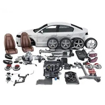 Various automotive components including seats, wheels, engine parts, and chassis elements arranged in front of a sedan