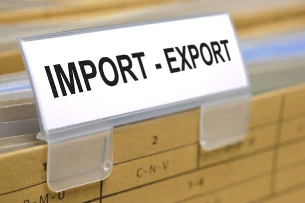 Close-up of a document tab labeled “Import – Export” symbolizing international trade