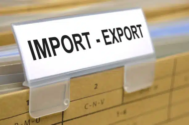 Close-up of a document tab labeled “Import – Export” symbolizing international trade
