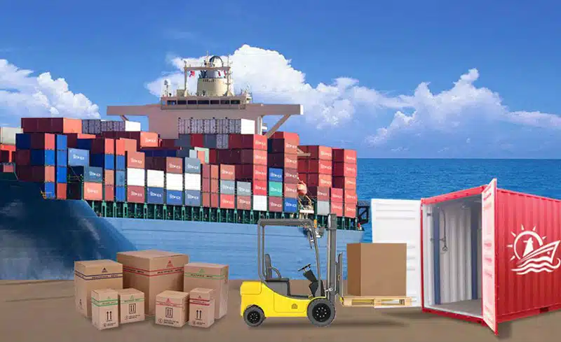 Forklift loading palletized boxes into a partially open container in front of a large container ship at sea