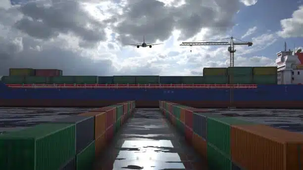 Cargo containers and plane at seaport representing multimodal freight out logistics