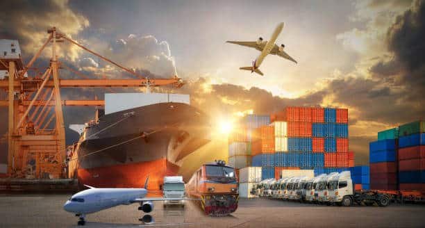 A large container ship loaded with cargo sailing on the sea, used for freight shipping from China to Ghana.