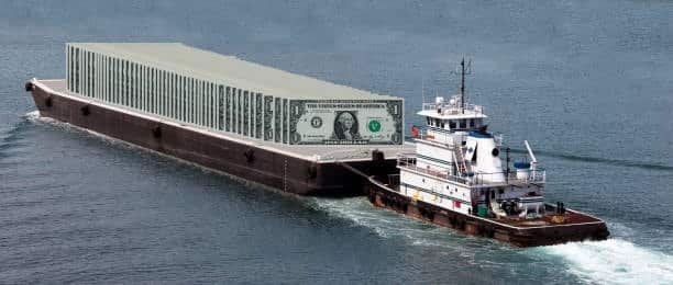Tugboat pulling a barge loaded with US dollars, symbolizing shipping expenses