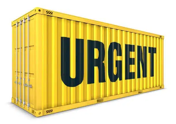 Priority shipping container with urgent label for express freight out