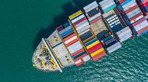 Top-down view of a container ship transporting cargo from China to Singapore.
