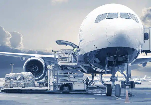Cargo being loaded onto a freighter aircraft, representing air cargo service from China to Venezuela