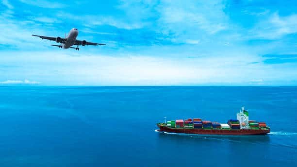 Airplane flying above a cargo ship in open sea, symbolizing the China to Mexico shipping route.