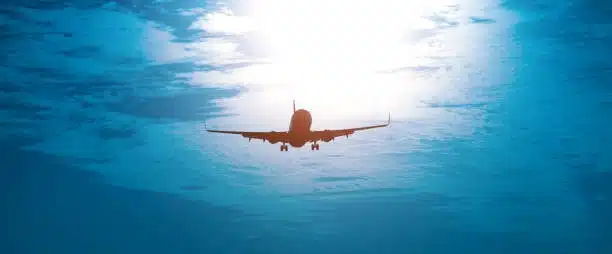 Silhouette of a cargo aircraft flying during sunrise, symbolizing fast and reliable air freight shipping from China