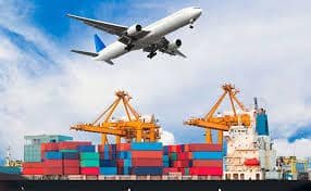 Airplane flying over a port with cargo containers, representing multimodal shipping to Jordan.