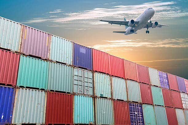 Airplane taking off above colorful shipping containers, symbolizing air cargo from China to South Africa