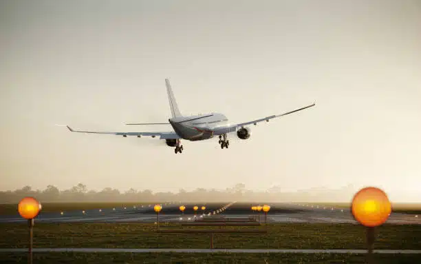 Airplane landing on runway, symbolizing cargo arrival in Pakistan from China