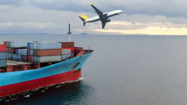 Aircraft taking off near container ship, symbolizing multimodal shipping from China to Saudi Arabia.