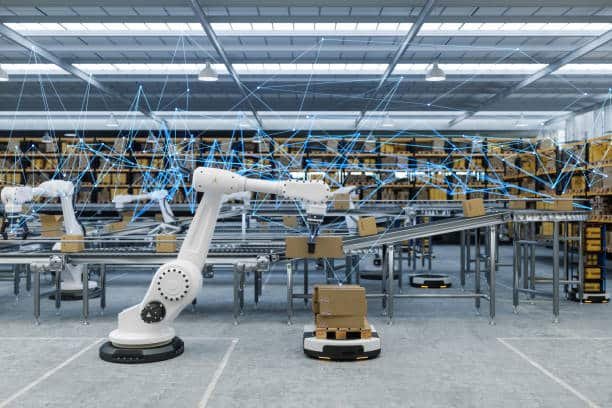 Robotic arms and smart conveyor systems in an automated logistics warehouse