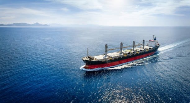 Bulk carrier ship transporting unpackaged cargo across the ocean for global trade