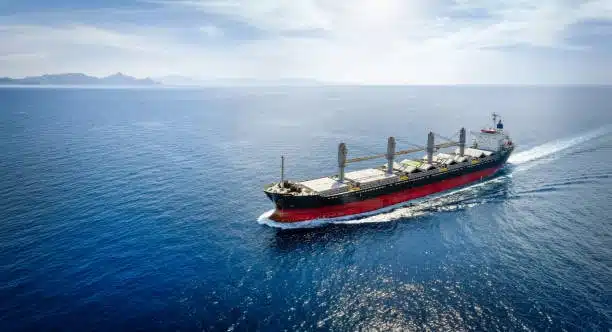 Bulk carrier ship transporting unpackaged cargo across the ocean for global trade