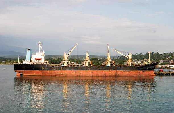 Large cargo ship anchored at Costa Rican seaport for loading and unloading operations