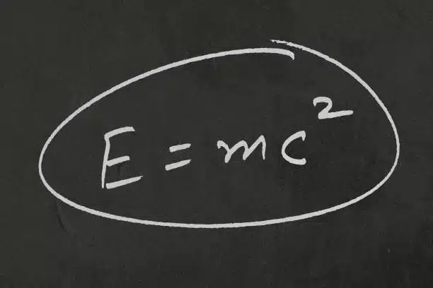 E = mc² formula on blackboard representing the importance of calculation in conversions