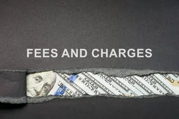 Torn paper revealing U.S. dollars behind text showing CFS fees and shipping charges