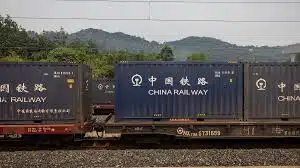 China Railway freight train carrying containers along the China–Laos railway route.