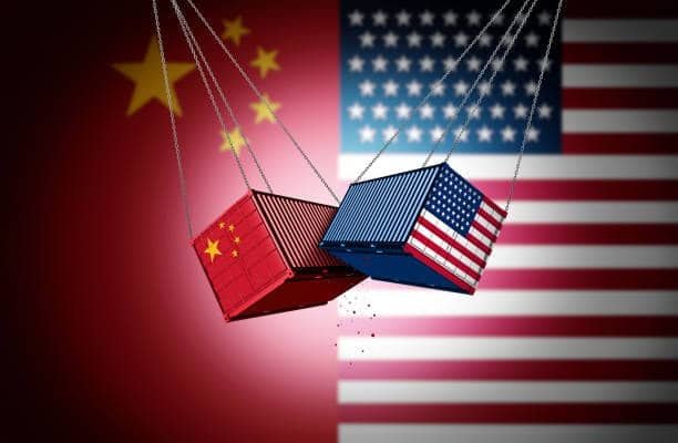 Shipping containers with Chinese and US flags symbolizing cross-border e-commerce trade