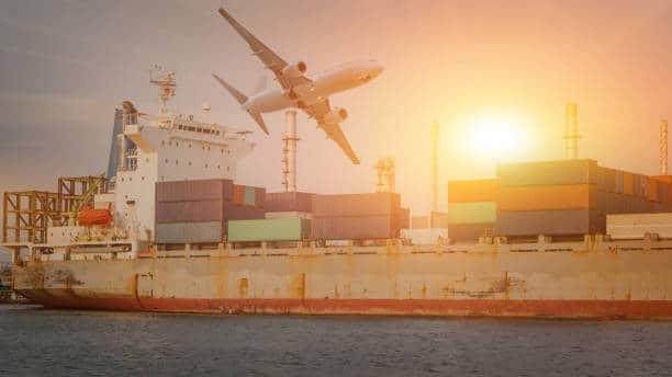 Large cargo vessel and aircraft in motion, representing international freight from China to Hungary.