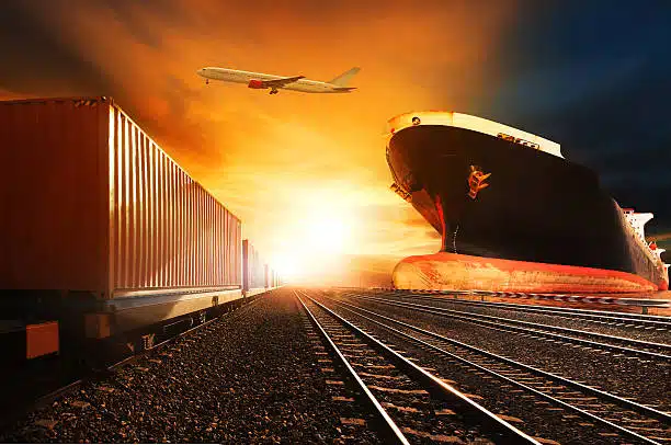 Shipping containers, cargo ship, and rail freight depicting logistics from China to Spain.