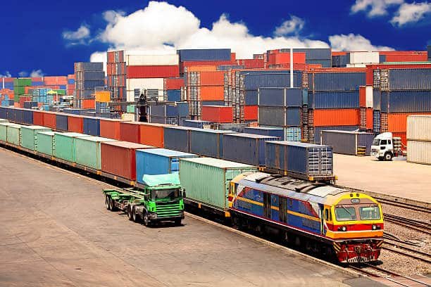 Container depot with rail and truck freight services prepared for shipping from China to Chile.