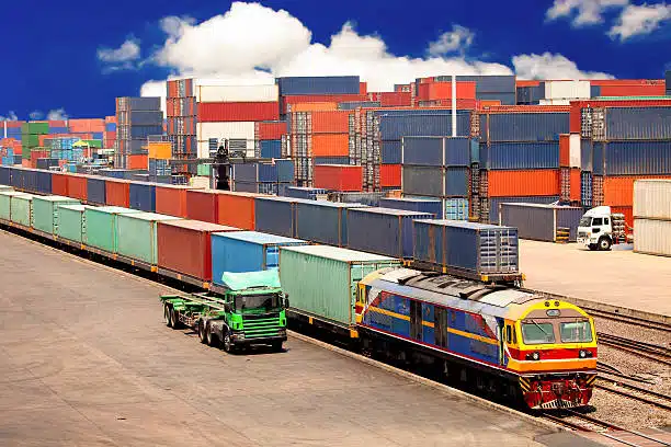 Container depot with rail and truck freight services prepared for shipping from China to Chile.