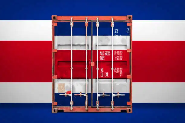 Backside of shipping container painted with Costa Rica flag against national backdrop