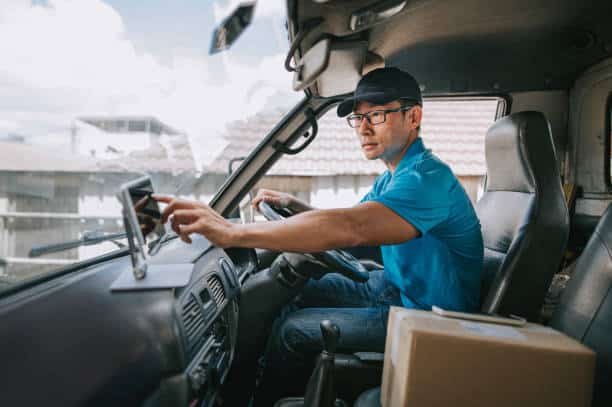 Delivery driver navigating route for international shipping