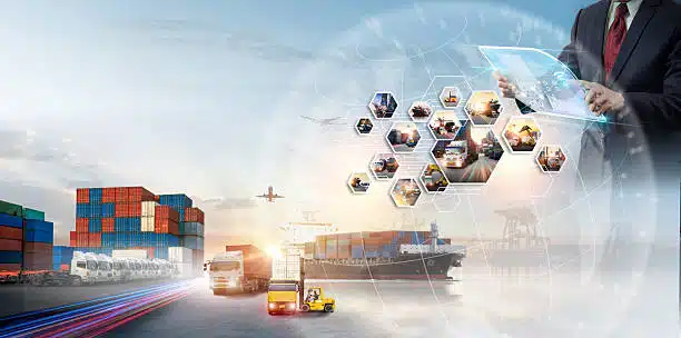 Businessman using digital logistics interface with ships, trucks, containers, and planes showing global freight to Greece