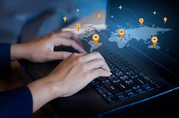 Person tracking global shipments on a digital map interface
