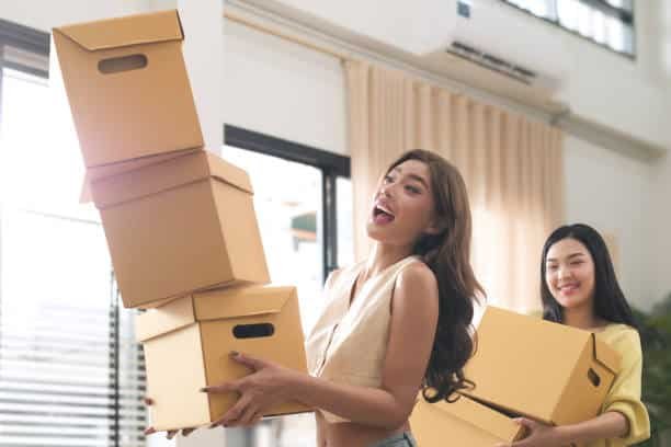Women holding boxes representing eCommerce shipments from China to Somalia