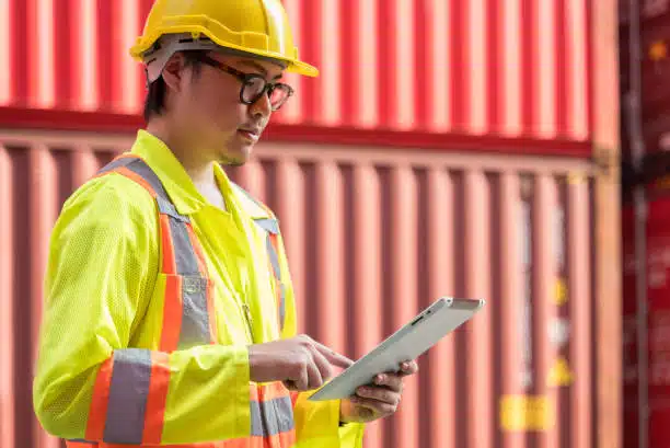 Freight supervisor inspecting shipments before exporting from China to Somalia