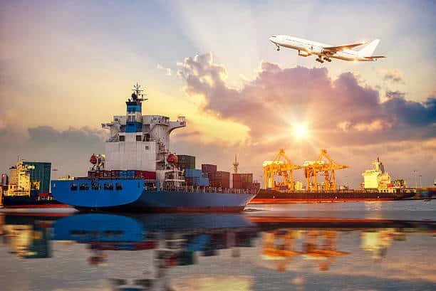 Cargo ship and airplane at sunset, representing international shipping from China to Hungary.