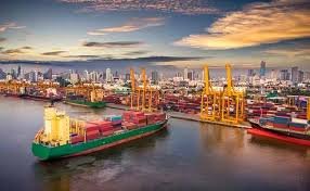 Container vessels at port terminal in Bangkok, Thailand, handling cargo shipments from China.