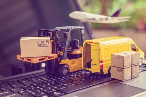 Logistics concept with forklift loading parcel onto van and airplane in background