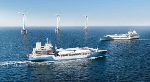 Eco-friendly cargo ships sailing near wind turbines en route to Senegal