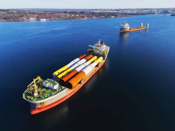 Oversized cargo ship transporting large industrial equipment, showing project logistics capacity