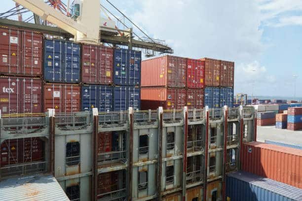 Shipping containers being loaded for ocean freight from China to Egypt.