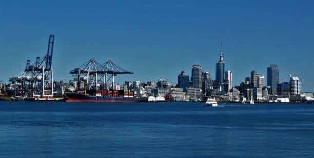 Container port operations in New Zealand showing cranes and shipping lanes