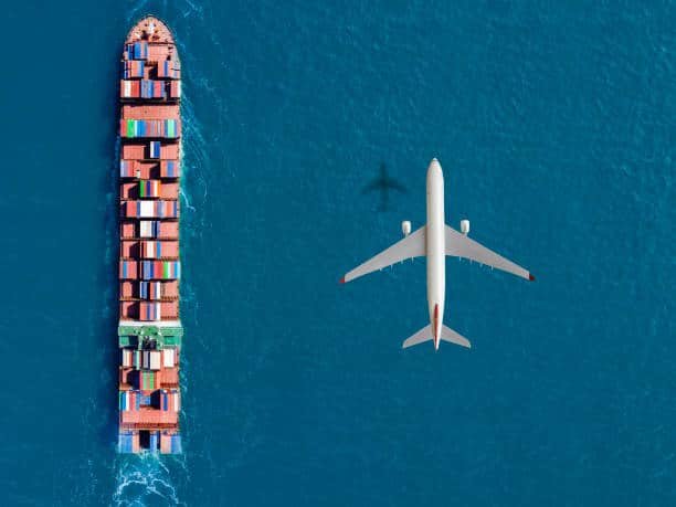 Top view of cargo ship and airplane over ocean, illustrating sea and air freight from China to Algeria