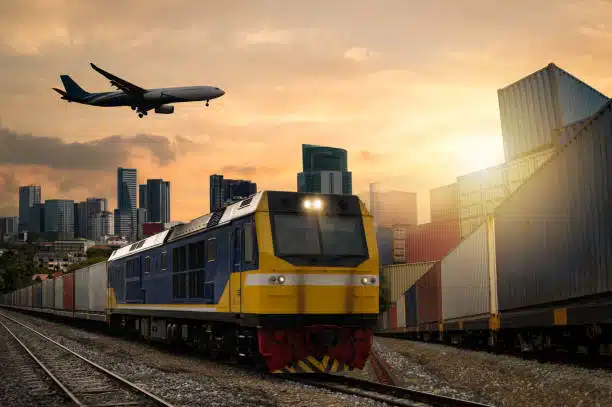 Freight train and cargo plane representing shipping routes from China to Spain.