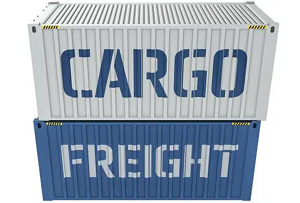 Large cargo containers labeled freight and cargo in warehouse storage